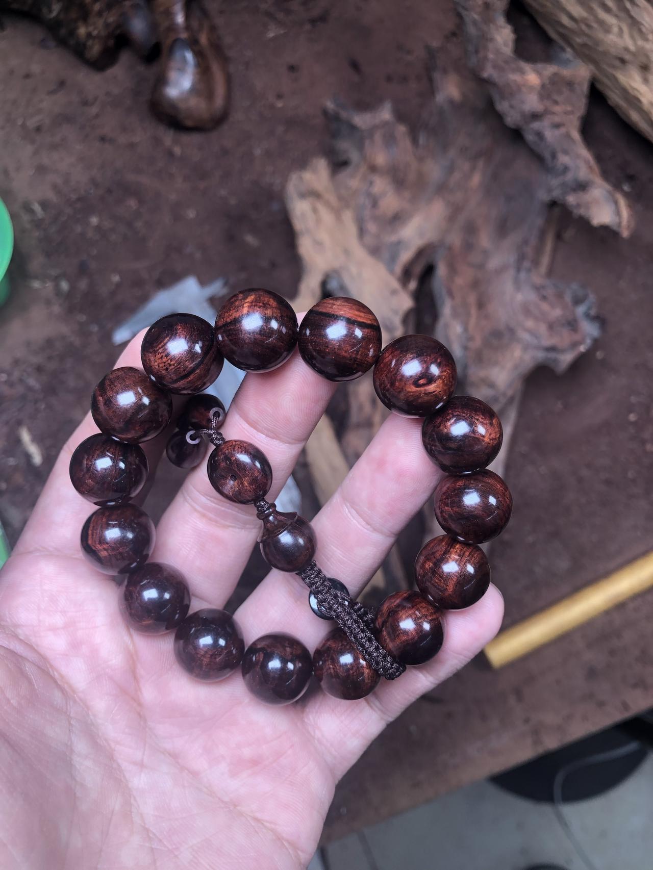 发个你的手串图片来看看很精美的海南黄花梨紫油梨1.5珠子