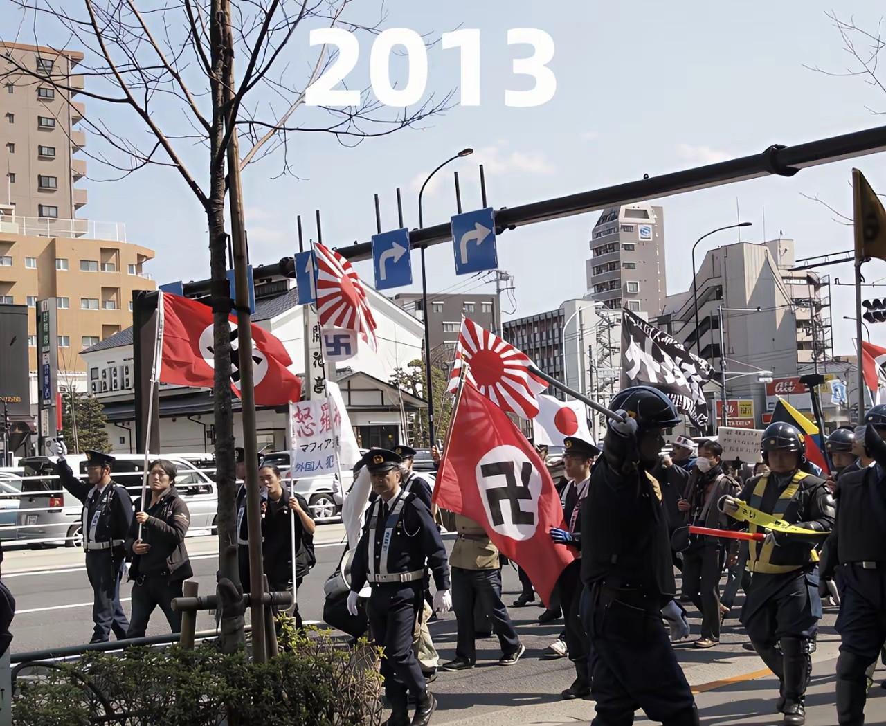 看看日本街头从未消失的纳粹旗和旭日旗，日本军国主义死灰复燃的迹象越来越明显。
从