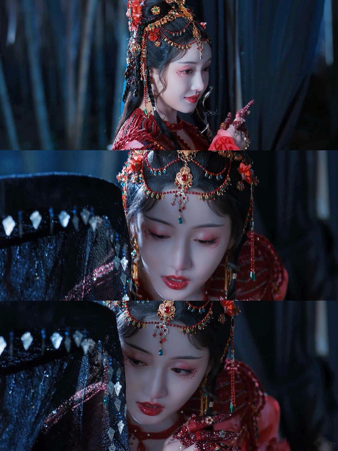 姜贞羽戴着妙脆角就开大了姜贞羽一进入打戏状态漫天花瓣里她指尖泛冷光，裙摆扫过花海