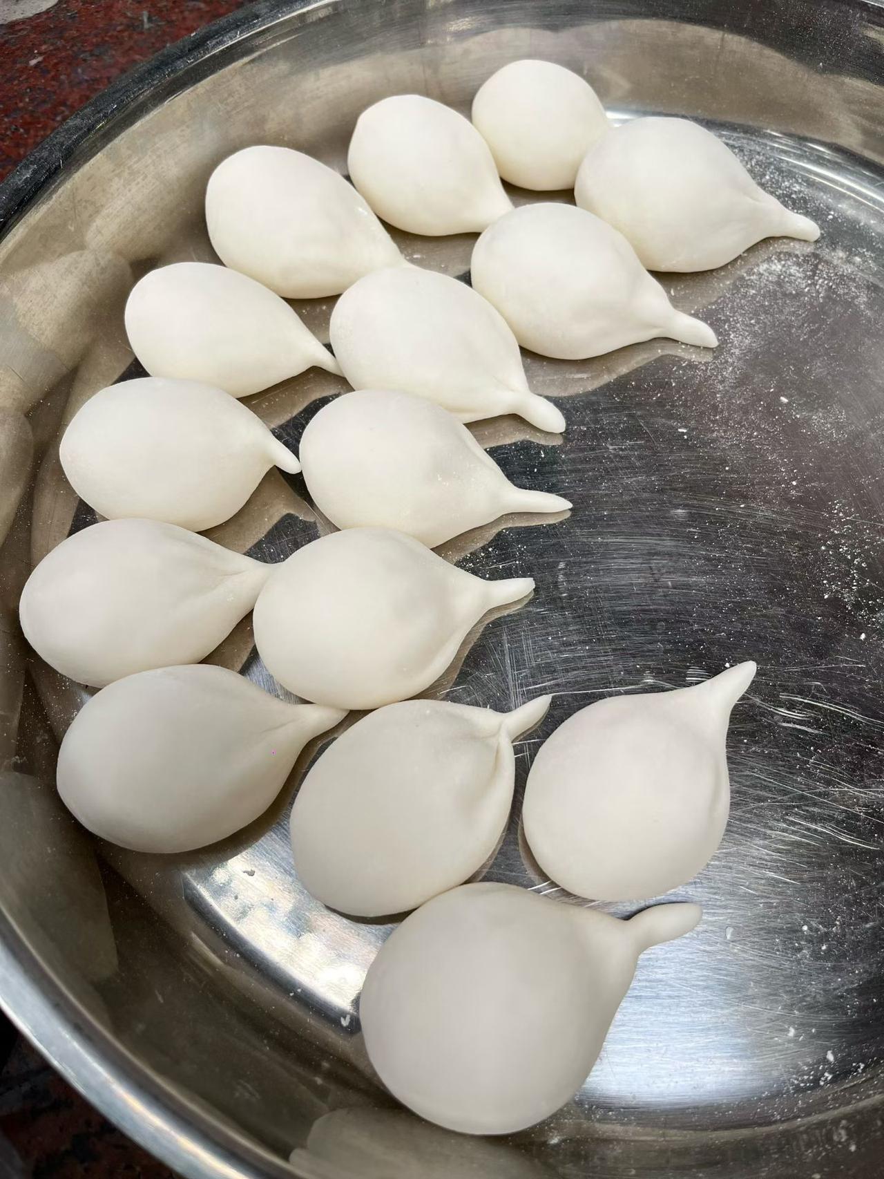 开油锅的香气一飘，年味儿就真的到家了！听着热油滋滋作响，看着煎堆在锅里慢慢滚圆、