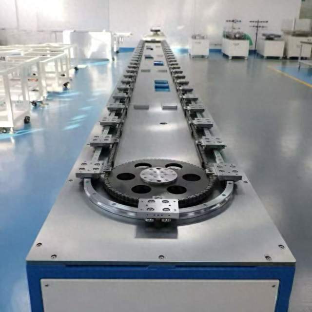 万台人形机器人产能瓶颈怎么破 环形流水线实现机器人零件自动返修