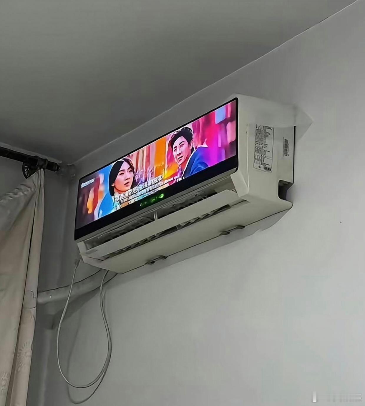 空调电视机一体化，以后要看广告才能吹空调吗？[哈哈] ​​​