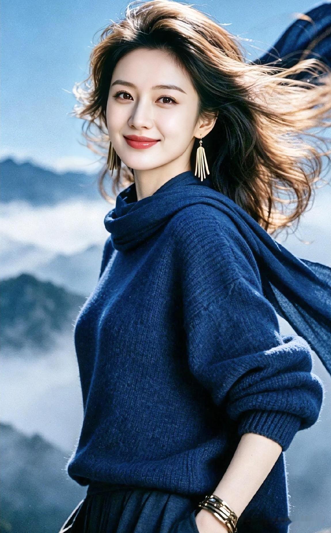 远山如黛，晴空万里。一袭深蓝毛衣映衬着她明媚的笑靥，长发随风起舞，耳畔流苏轻晃。