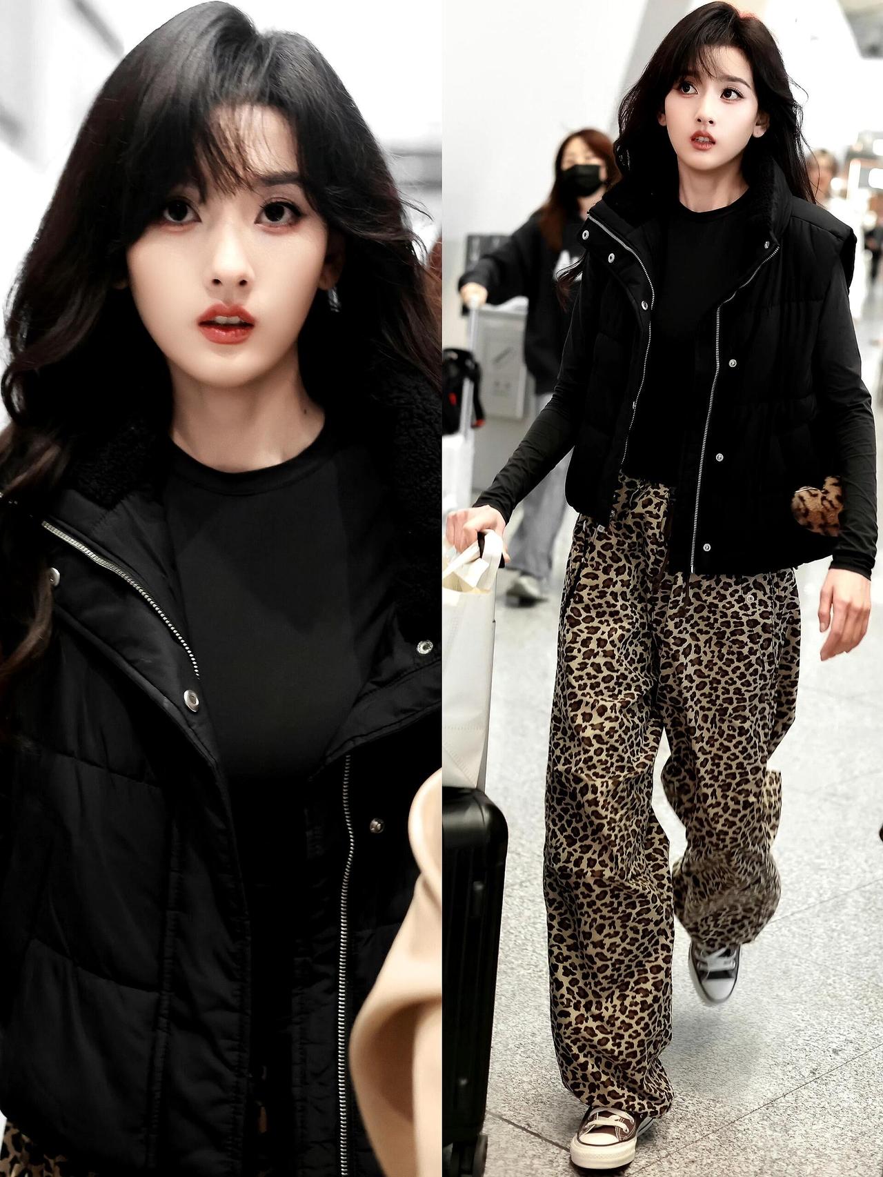 宋祖儿街拍，这次的港风很适合她！
黑色马甲搭配紧身黑打底，又酷又保暖，豹纹阔腿裤