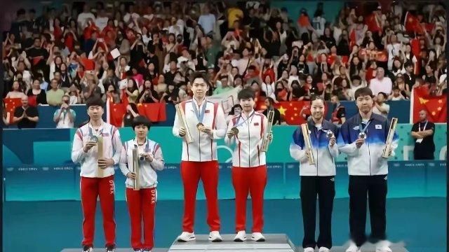 2024年的官方总结上有莎莎和王楚钦巴奥混双夺金的照片有莎莎和王楚钦去中关村小学