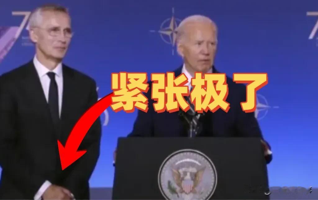 北约秘书长，跟一个犯了错的小孩子一样！这张图很有意思，是斯托尔滕贝格在峰会上与拜