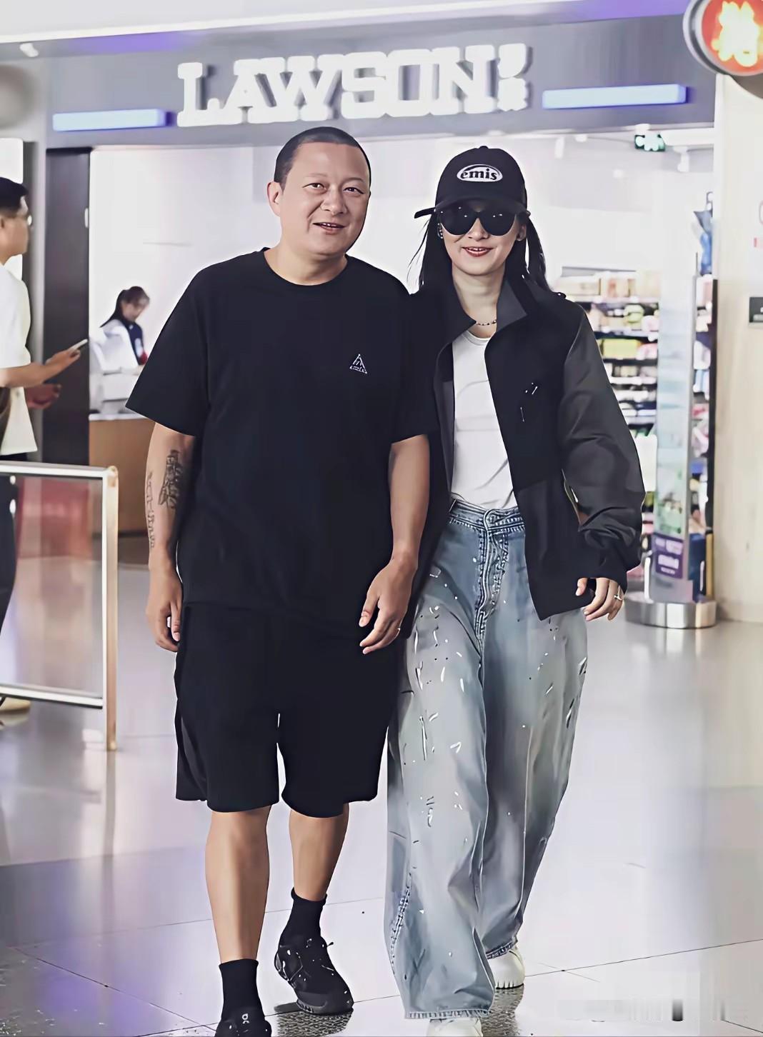 梅婷与老公，网友说，有点象父女梅婷写真 大明星夫妻近照