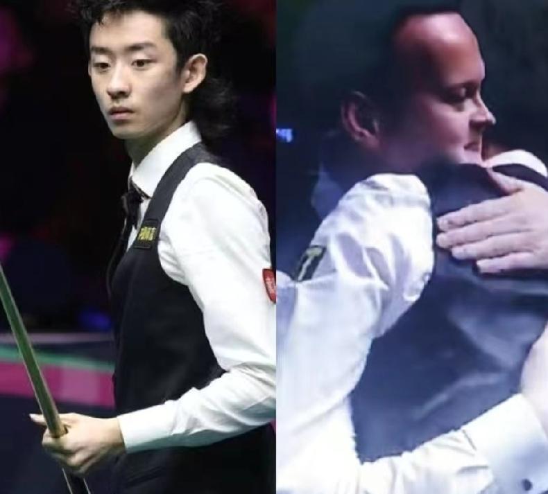 吴宜泽赢了，墨菲输了，但没人觉得输。

他赢完没跳没喊，直接跑过去抱住了墨菲。
