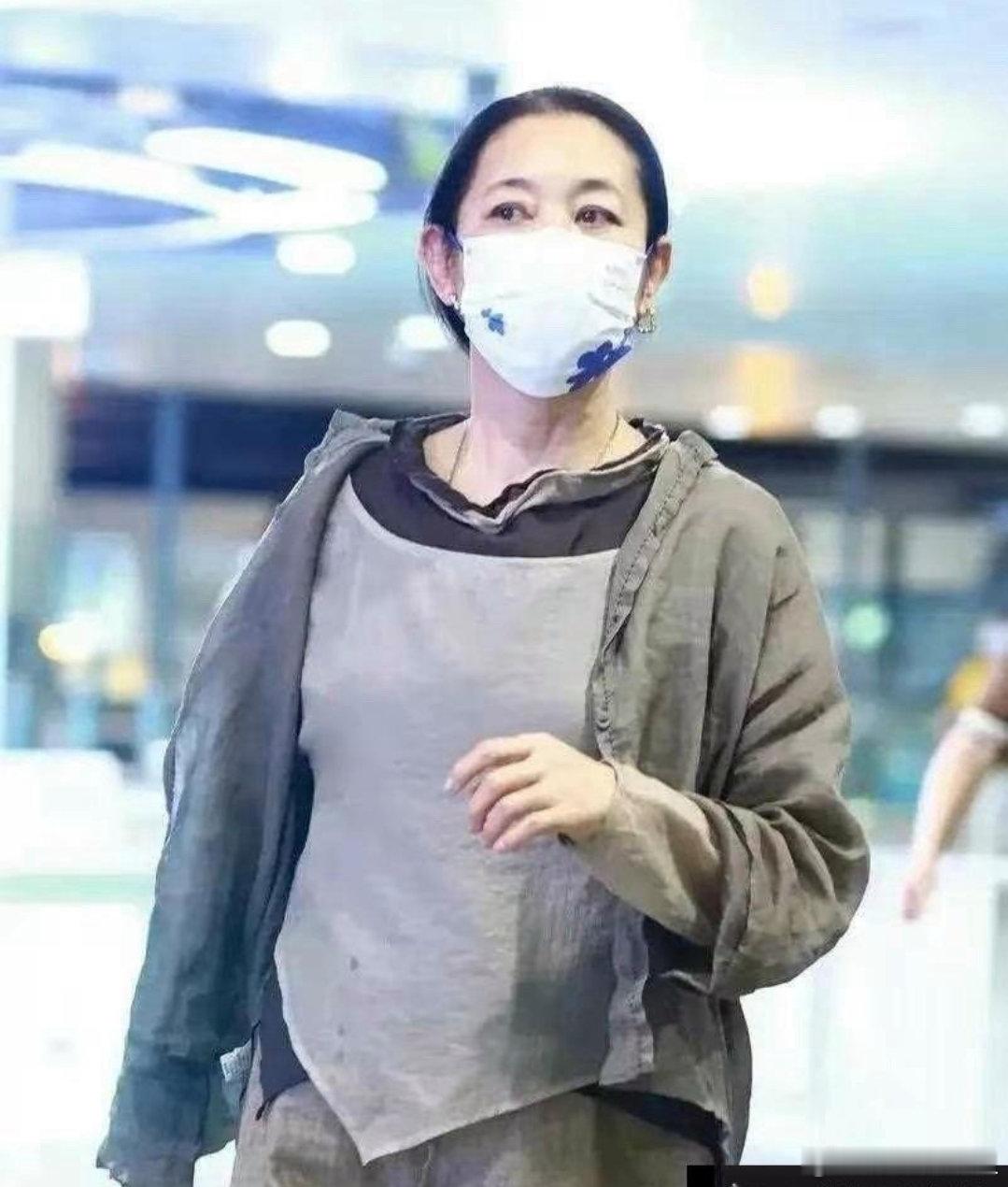 倪萍机场照片 ​​​