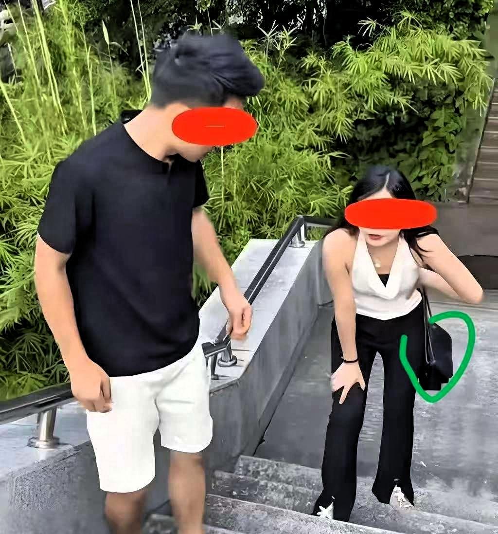 男子带着小三去爬山，途中遇到自己的老婆，当时他老婆没有揭穿男子和她自己的关系，换