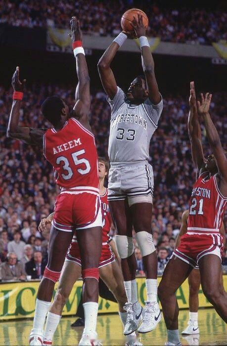 Patrick Ewing shooting over Hakeem Olaju