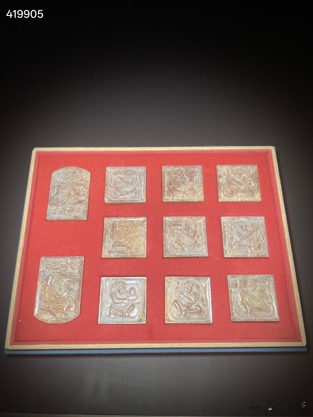 唐 和田玉胡人献宝带板一套
尺寸7.1×4.8×0.83厘米