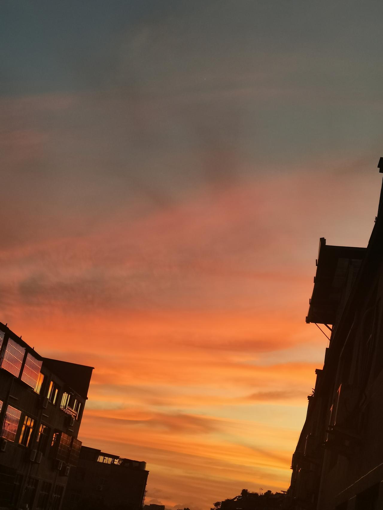 Watched the sunset from my window—like a