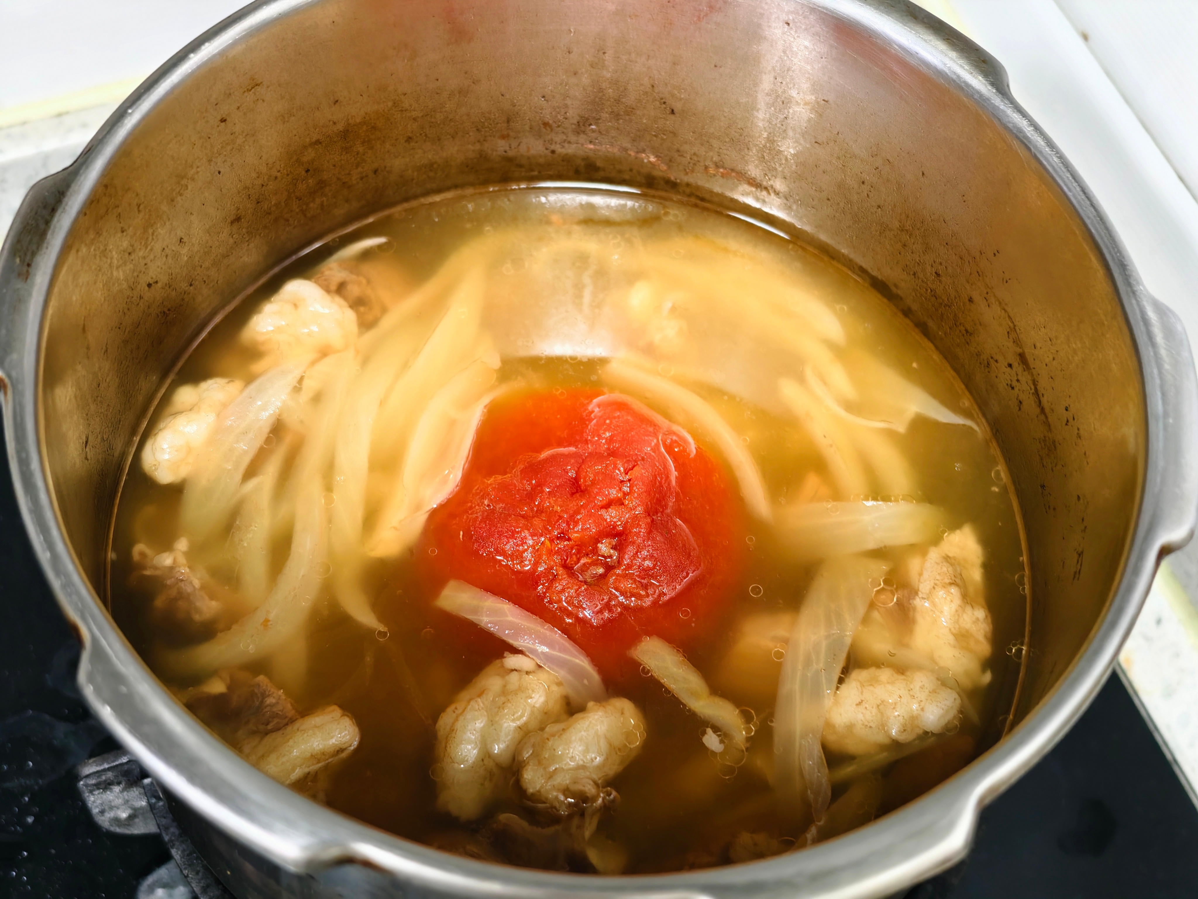 今天晚饭做砸了邻居教的菜谱--牛肉番茄汤做了一大锅，原计划的另外两个菜就没再做大