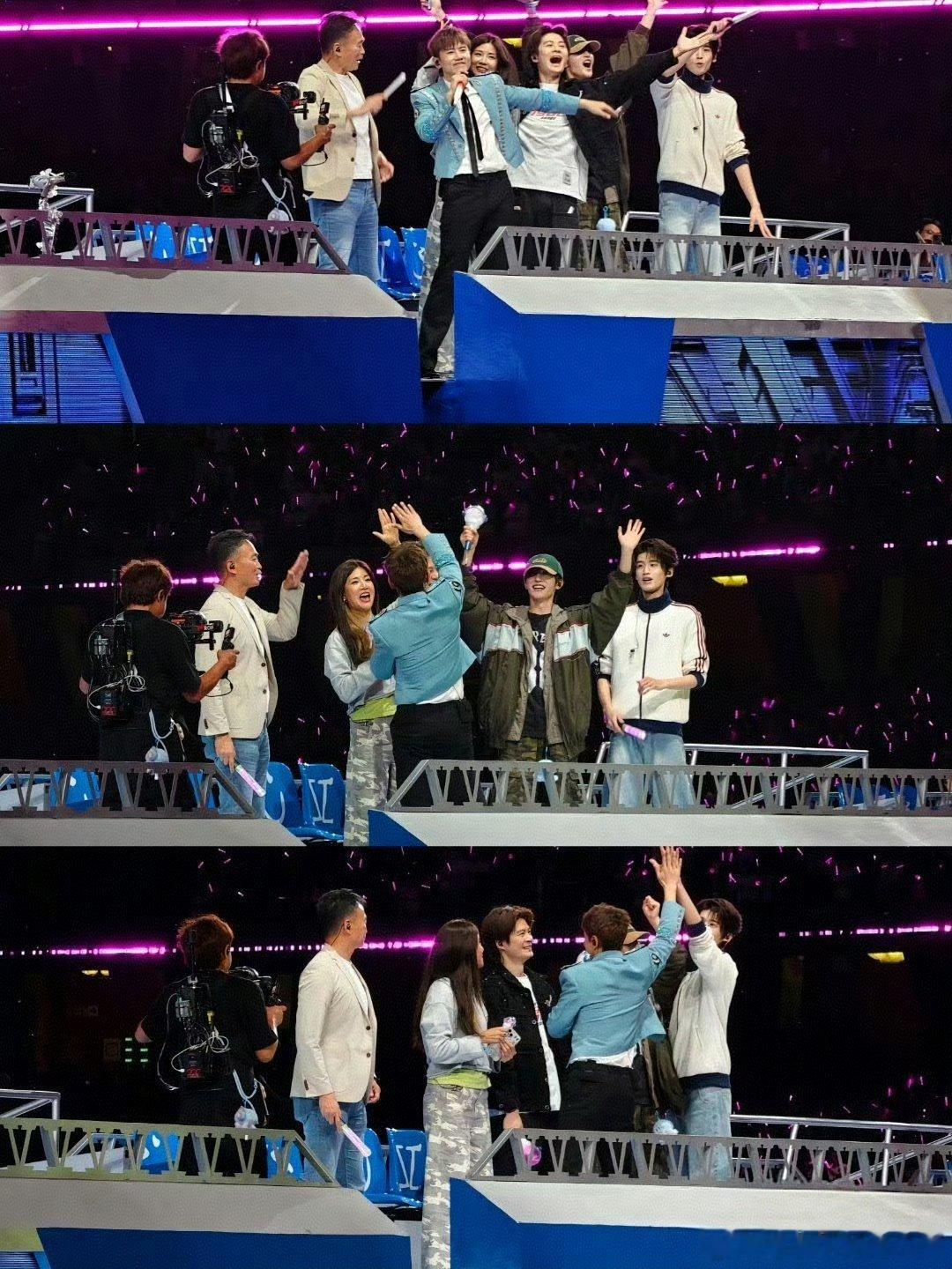 许智伟的手一直护着张杰 鸟巢现场，许智伟的守护满是温情，扶手臂挡危险。张杰从型秀