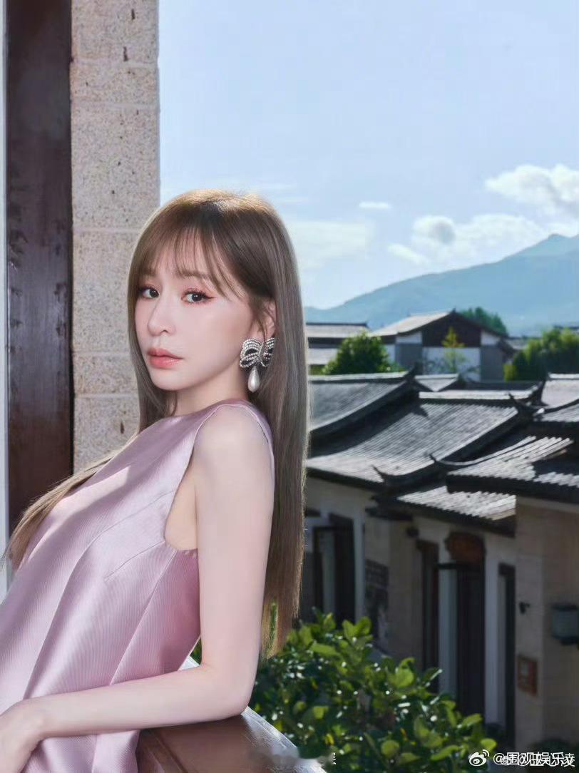 王心凌美到像p上去的王心凌美丽的丽江照 真是美景配美人啊～ 
