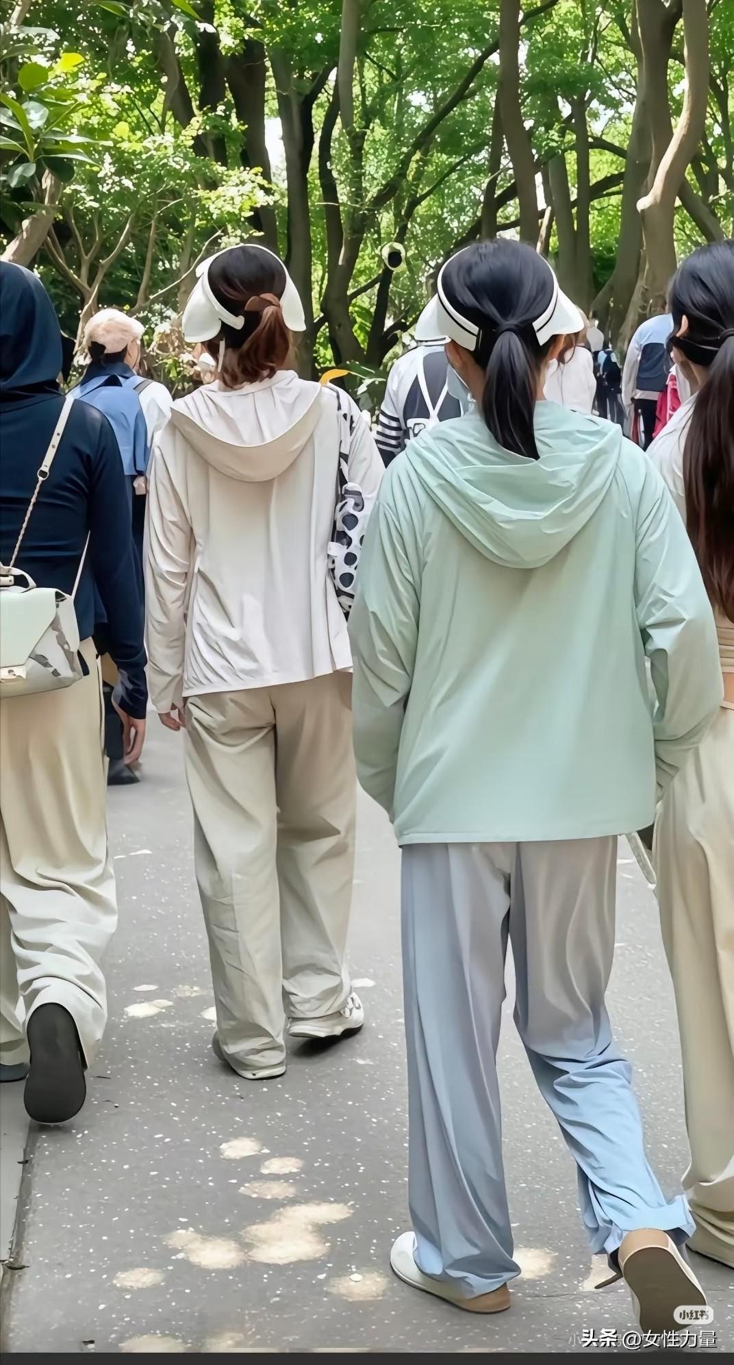 大街上全是各种各样的防晒衣，大热天难道不闷热吗？理解不了