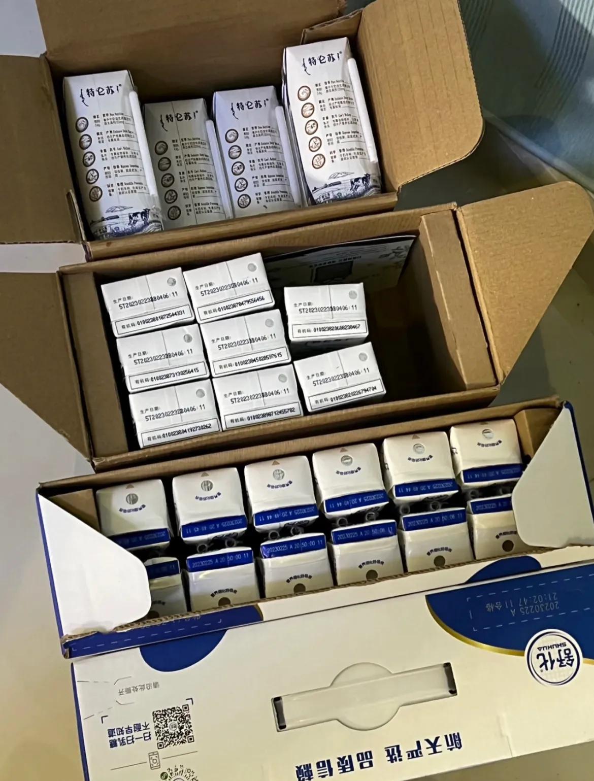 不认识的邻居敲开我家门，要送我家孩子两箱牛奶，还让我把喝完的牛奶盒子洗干净，她一
