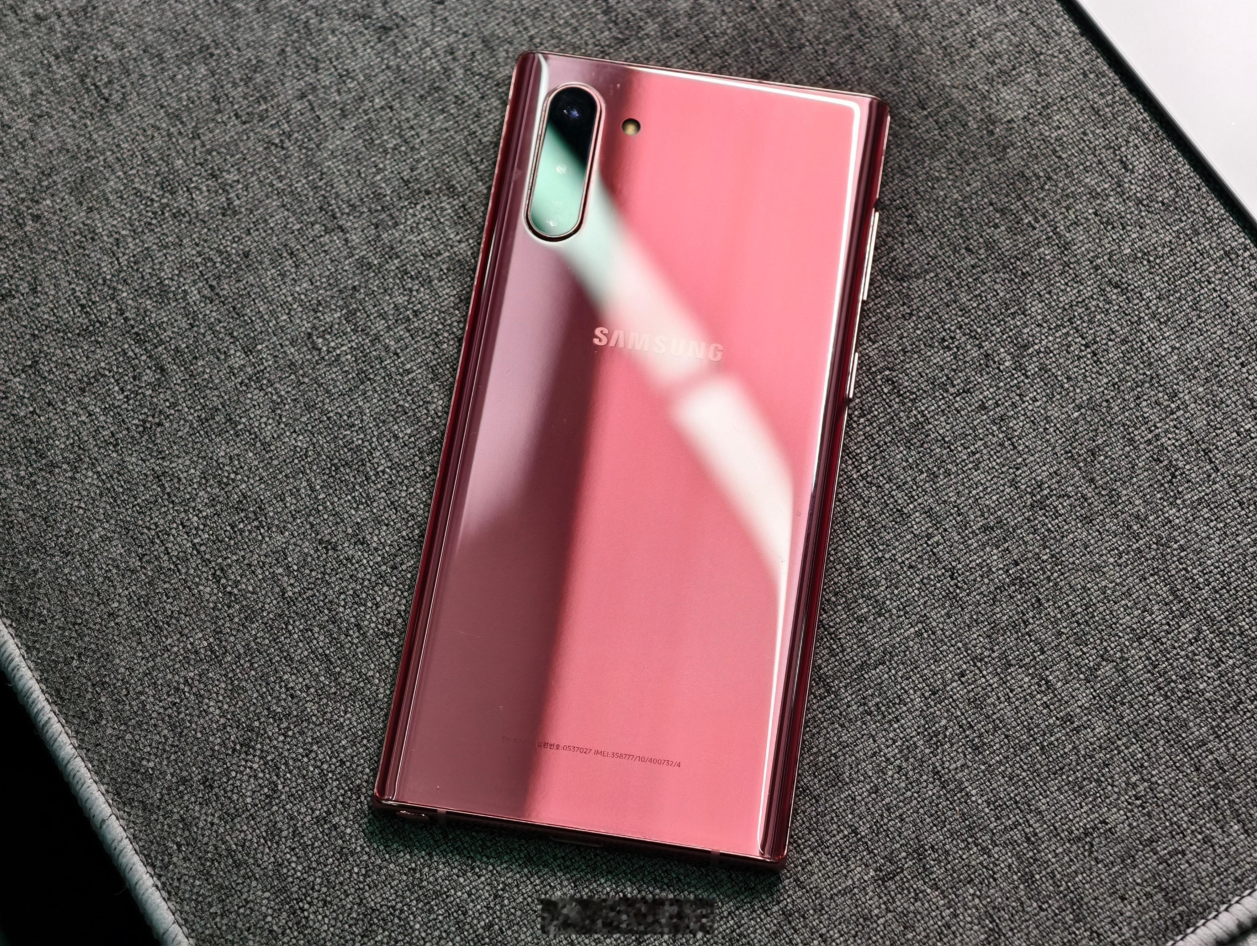 收了一台韩版粉色Note10，这部手机尺寸不大，跟X200 Pro mini差不