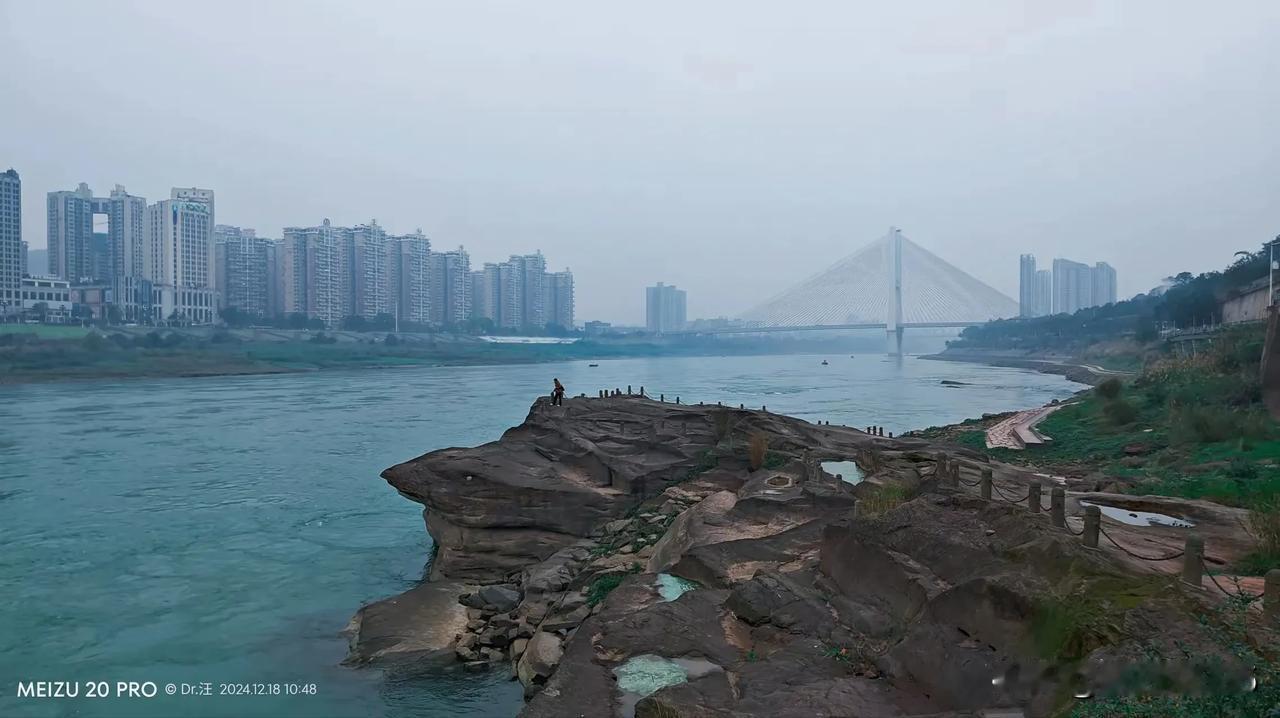 一江碧水赴东溟