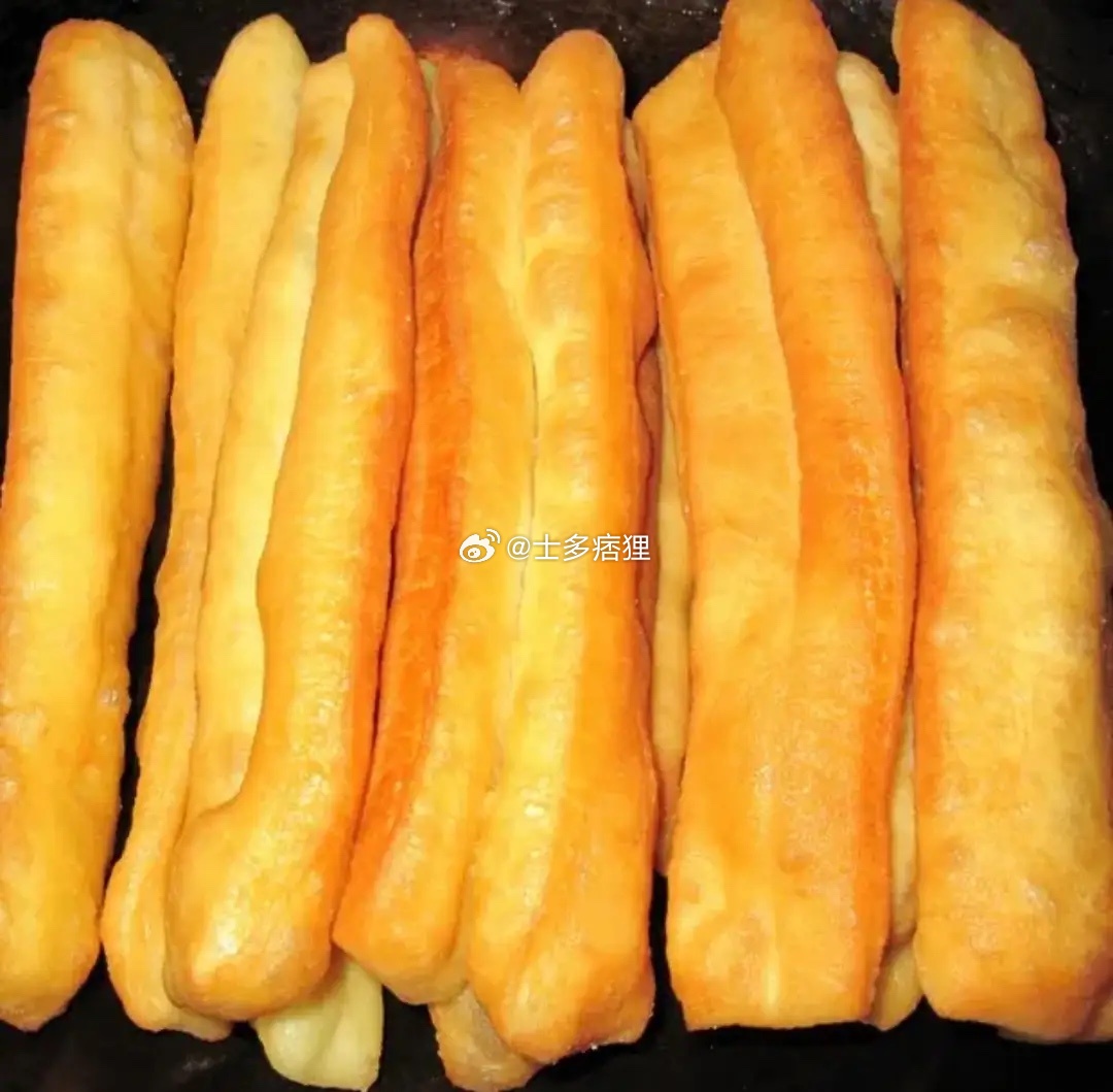 80年代的油条软塌塌的，现在的油条直挺挺的 