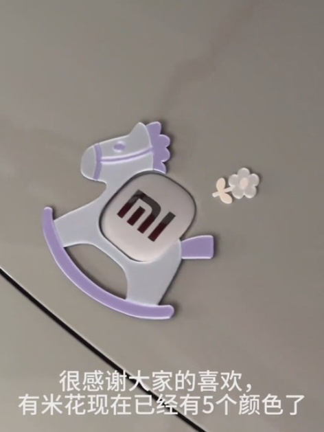 这个小米车标的“马上有米花”创意真不错，佩服网友的脑洞