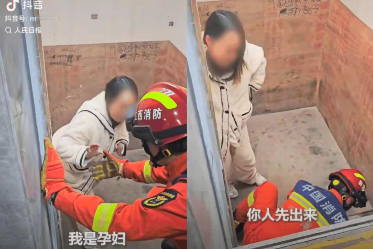 上人民日报了！江西萍乡，女子被困电梯，消防员想拉她上来。女子说了一句“我是孕妇”