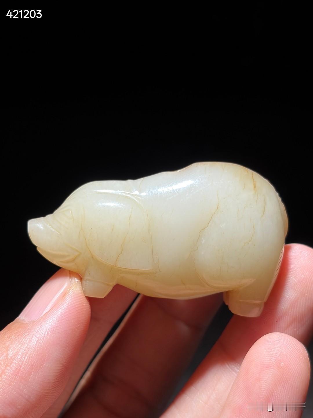 明 和田玉玉猪
尺寸5.1×2.8×2厘米重量40.4克