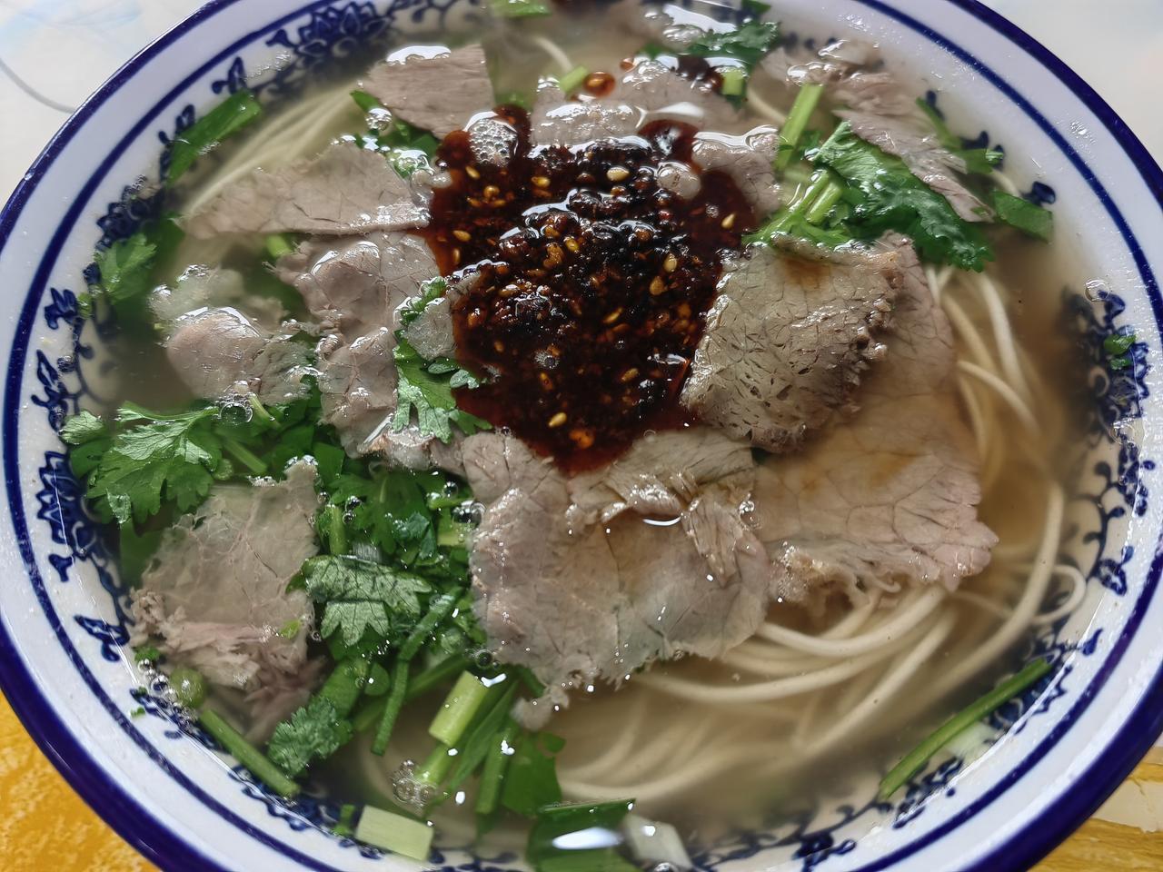 早上一碗拉面，吃了坐车回京。