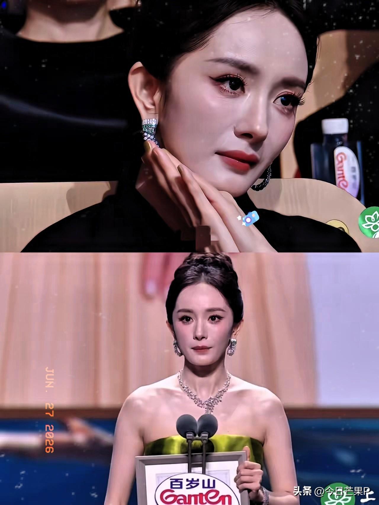 不怪杨幂有点不太高兴，
换成任何一个女人都忍不了吧。
明明自己盛装出席白玉典礼，