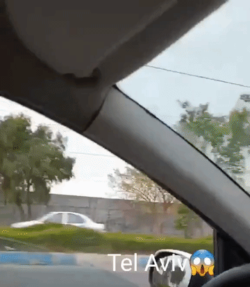 导弹来了为什么不能看热闹？
来看看这个看热闹的以色列人，哦，不对，以色列没有人，