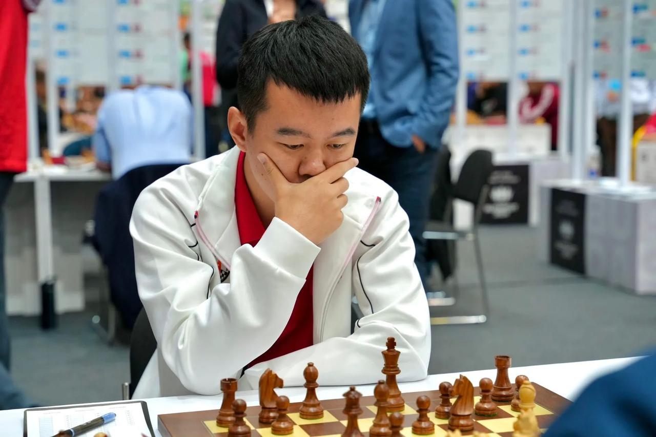 国际象棋奥林匹克团体赛第三轮战罢，世界冠军丁立人、卜祥志分别出战1、3台，各自战