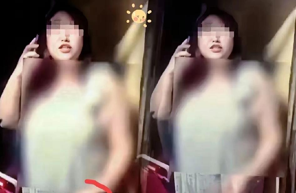 榴莲姐走出看守所，一副无所谓的样子。手里拿着手机不知道给谁打电话，这张脸大家都认