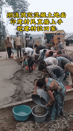 刚浇筑完混凝土路面，
印度村民直接上手拉回家[泣不成声]