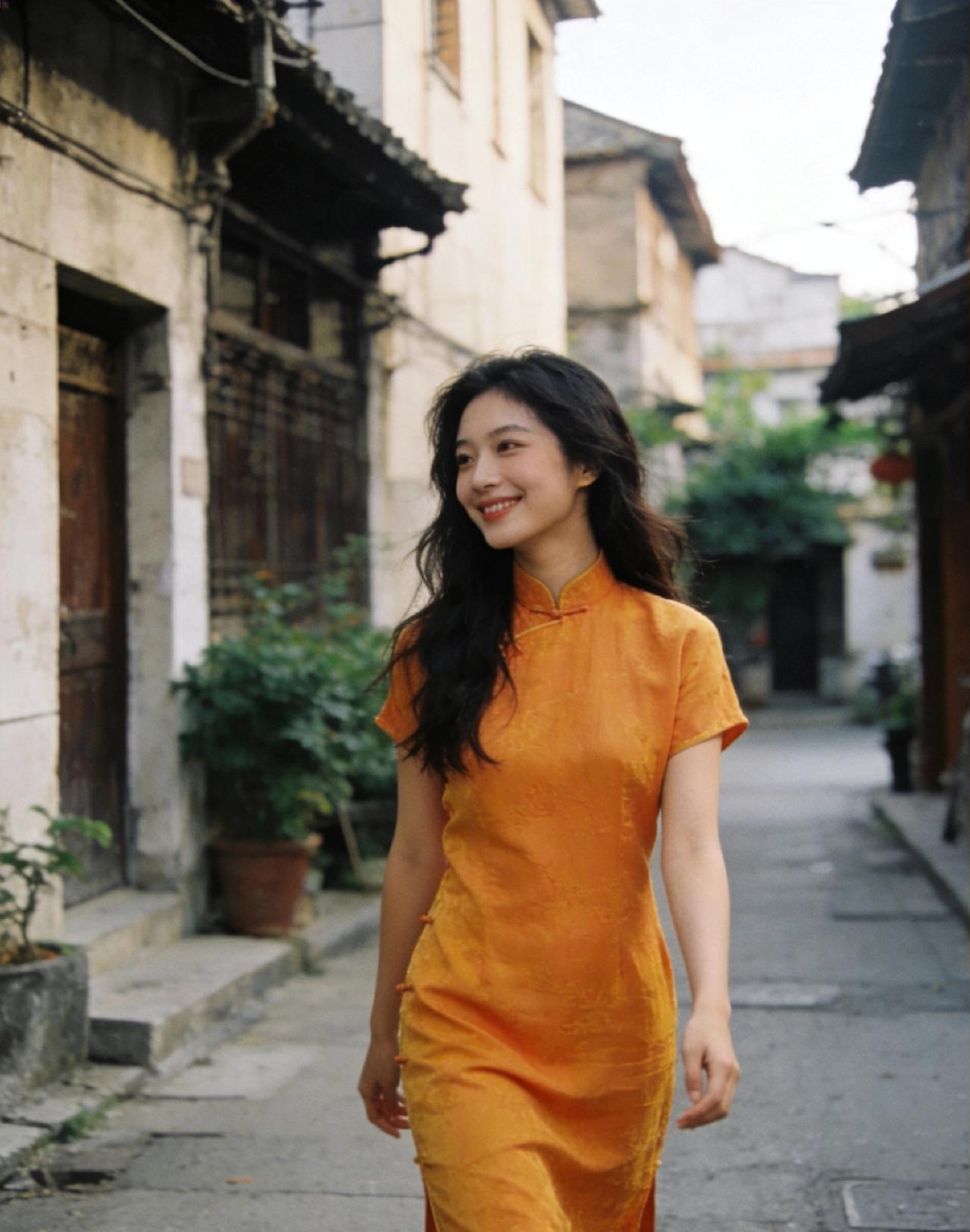 女生穿旗袍可以有多好看?

女生穿旗袍可以有多好看? 

桔黄色的旗袍，宛如将秋