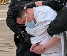 菲被遣返嫌犯刘某文，目测3、40岁，胖乎乎的，戴着一副眼镜，典型的心狠手辣笑面虎