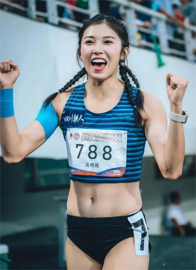 吴艳丽说，还是扎个双毛尾吧，展现中国女孩那种气质，站上赛场全力冲刺，刷新个人最好