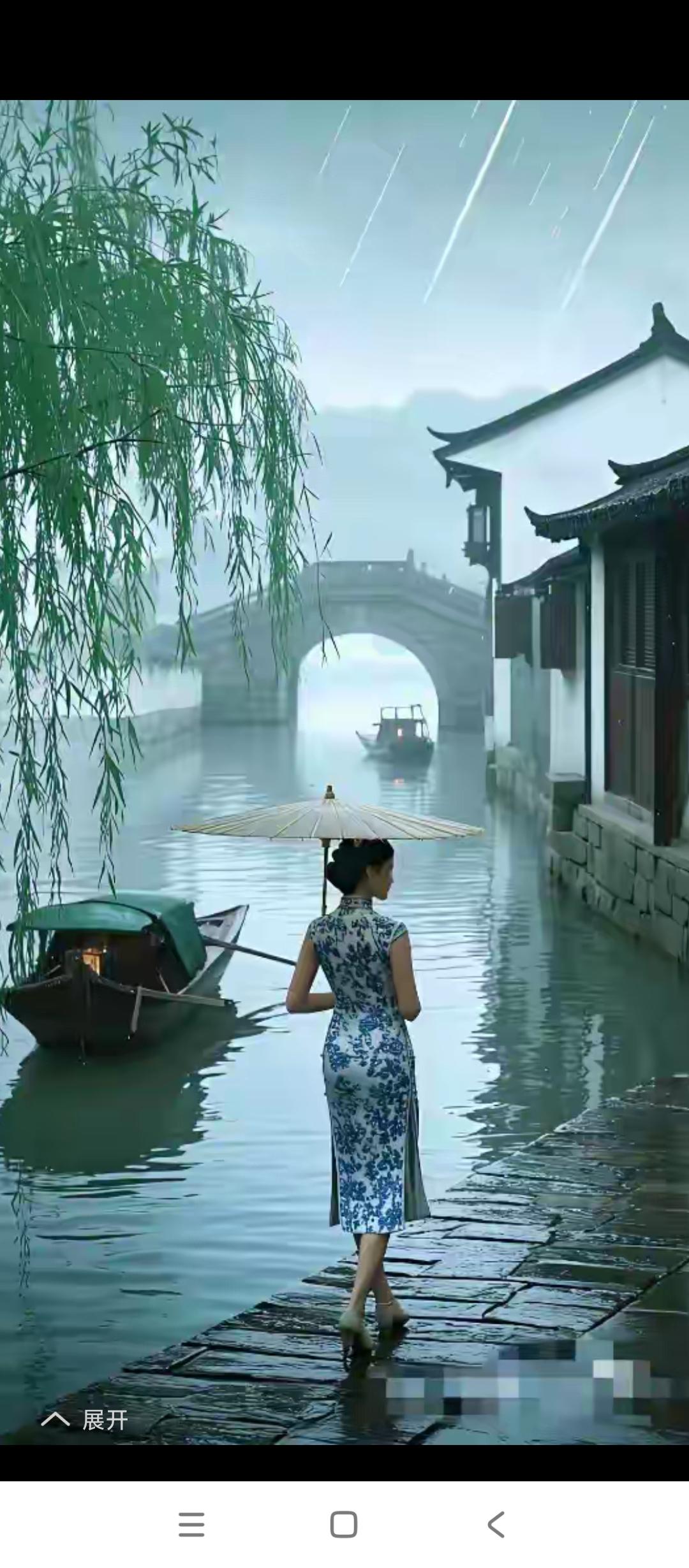 上联：一桥烟雨春江醉，/小兔邀对两岸繁花晓梦甜。