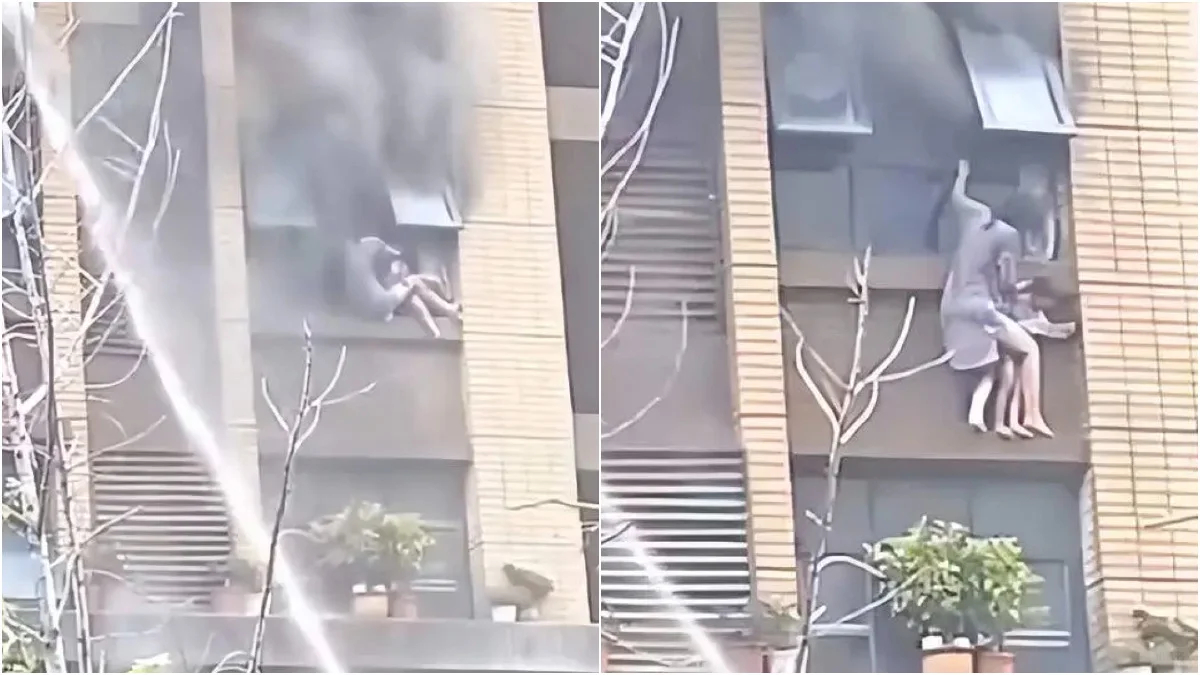 连云港母女 蒸汽烫人 两个人在楼房外立面苦苦坚持了许久，妈妈同时还要护住孩子不掉