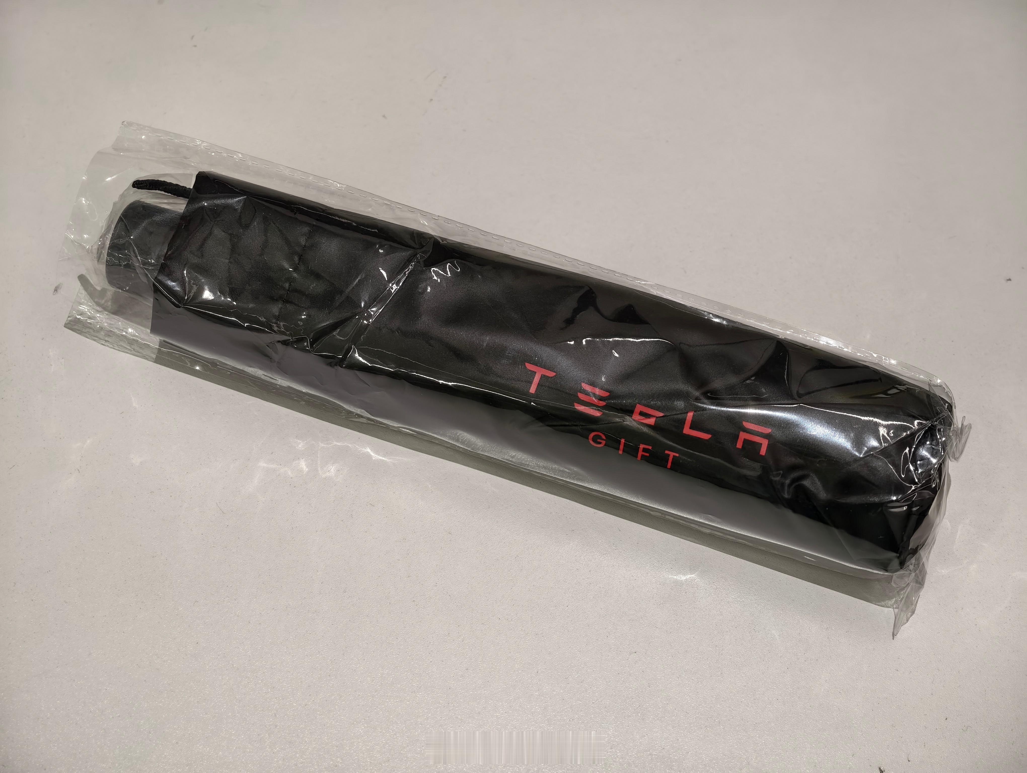 放点福利～关注+点赞，抽一把 TESLA Gift 雨伞！[喵喵] ​​​