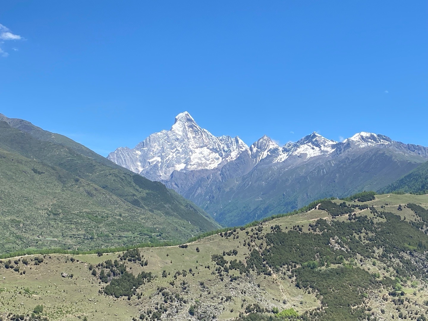 愿望是：明年一定徒步登上四姑娘山的大峰。 ​​​