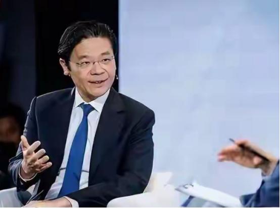 新加坡总理黄循财坐在加拿大电视台的聚光灯下，神情急切，语速紧凑，像急于递交一份“