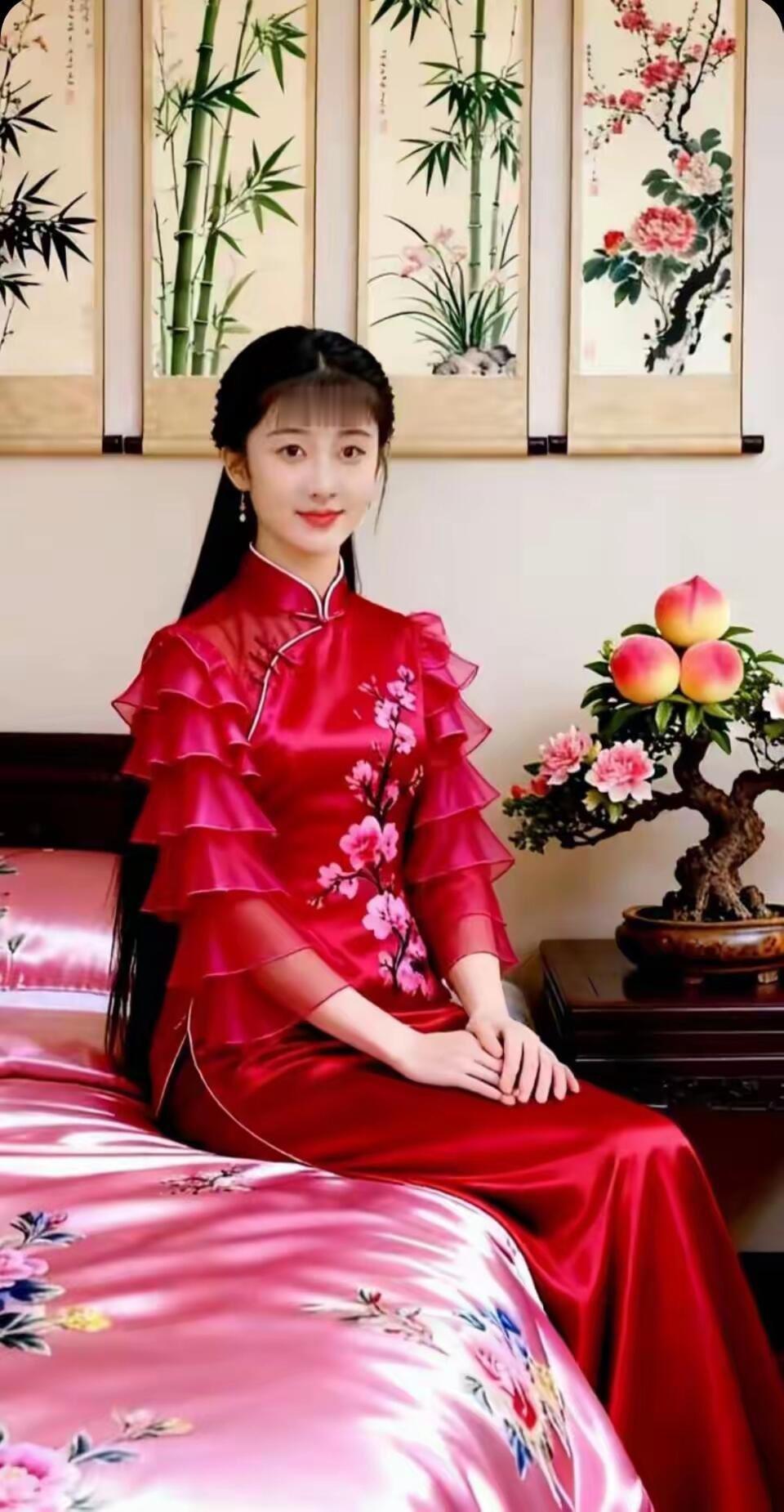 红衣美人坐，花枝映窗明。