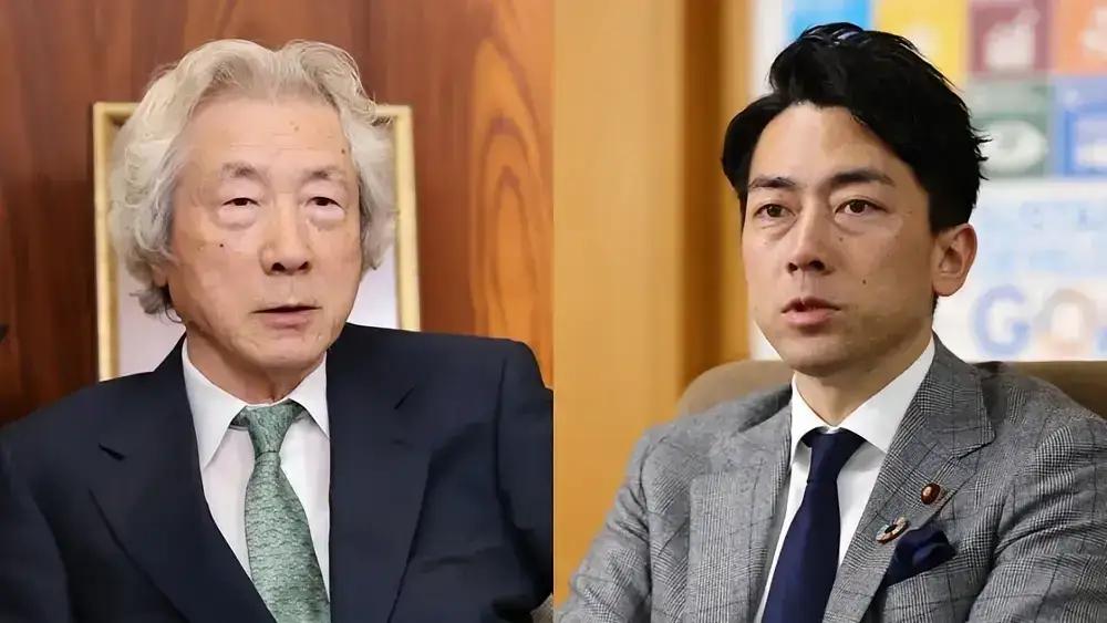 这是一对父子。日本防卫大臣小泉进次郎和他的父亲小泉纯一郎。
      父子俩都