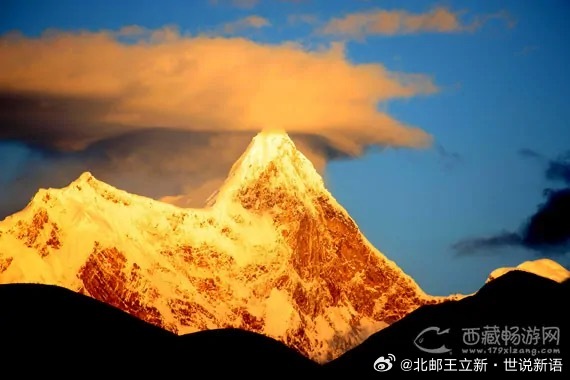 我的心超然于我头上的白发仿佛屹立着南迦巴瓦峰 ​​​