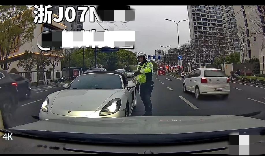 4月8日，浙江台州。保时捷车主不仅越双黄线逆行，还开远光灯挑衅正常行驶的视频车车