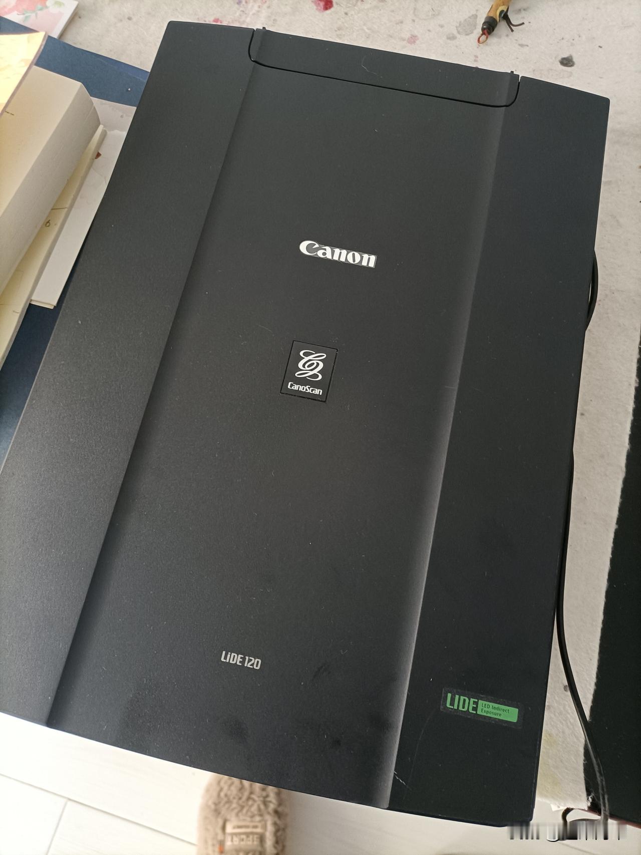 昨天从闲鱼花135元拍回一台二手佳能扫描仪，这是自己第一次在闲鱼上买东西。
买扫