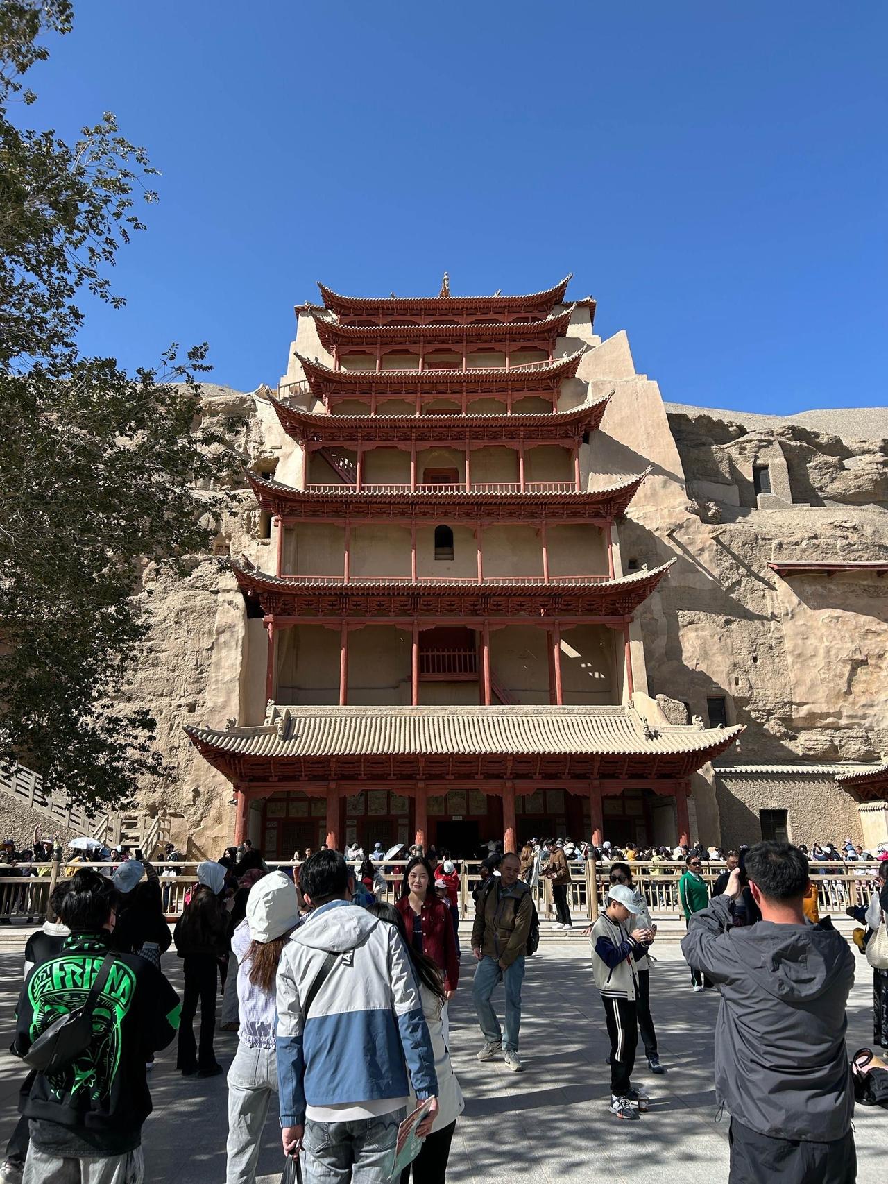 敦煌莫高窟不仅是佛之殿堂，更是中世纪全球化的微缩盆景。其罕见共存的宗教文献，深刻