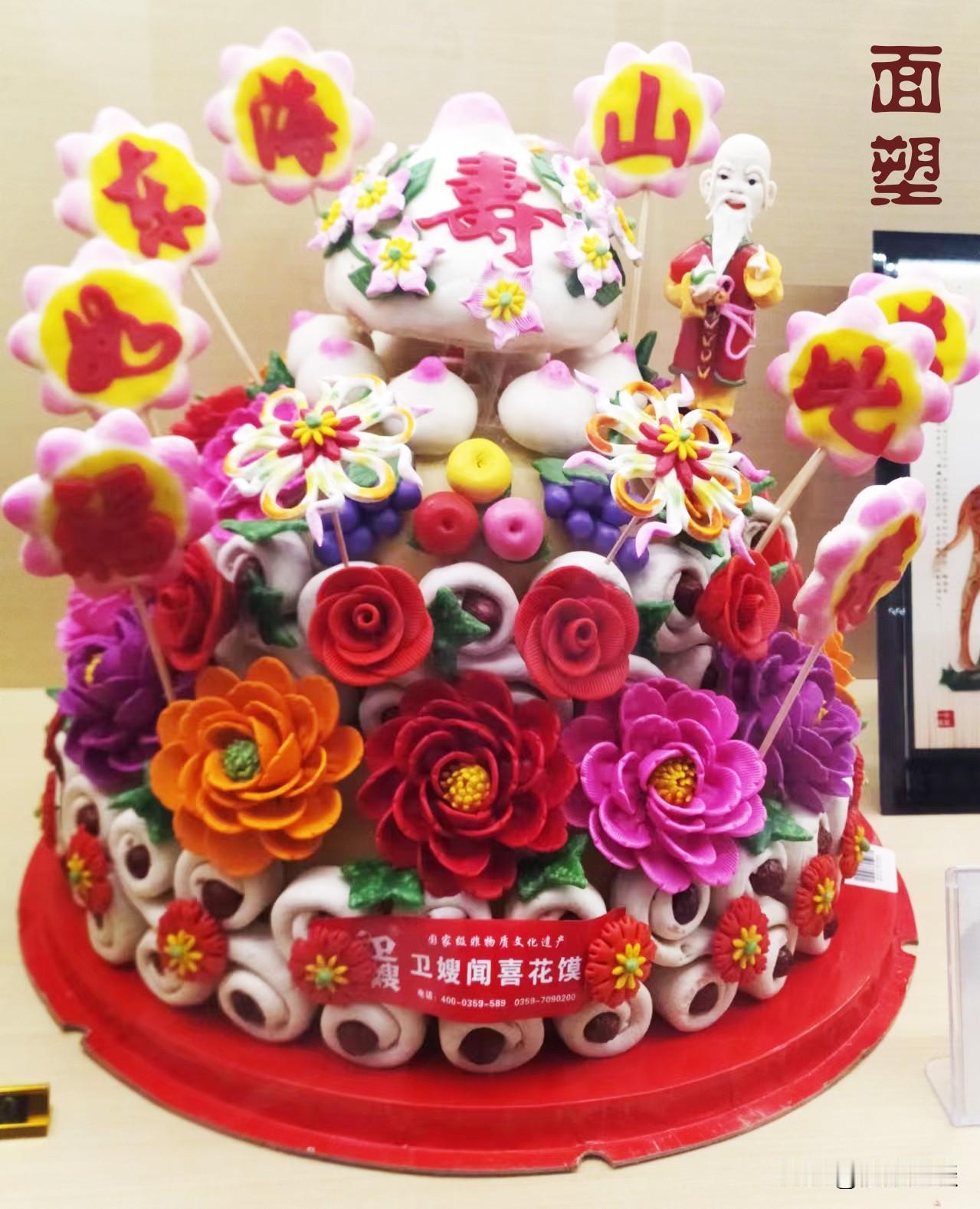 这那舍得吃，简直就是工艺品。元宵节期间，太原步行街展示山西民间技艺——面塑，手太