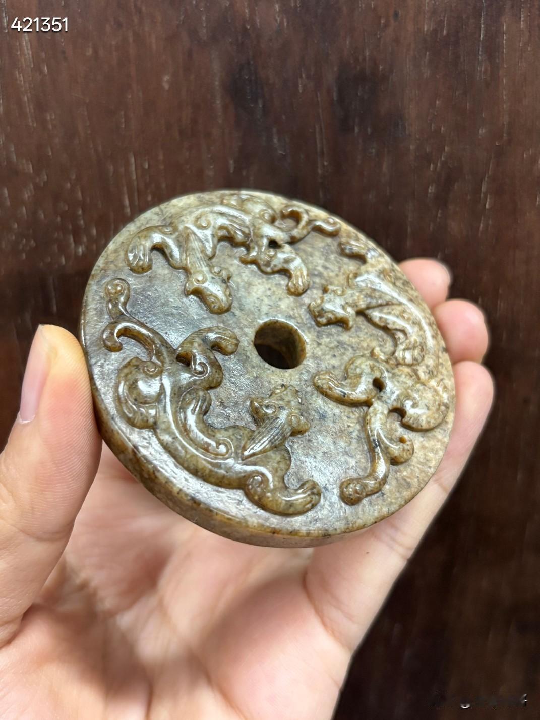 旧藏 高古玉螭龙璧
规格：6.55*1.1cm
重量：82.5克
